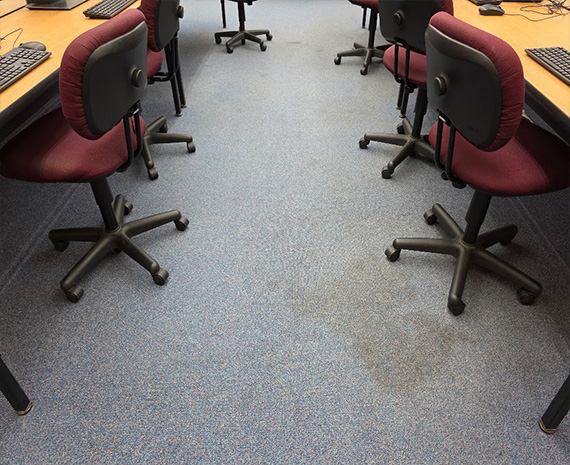 Drink spill spot on library carpet