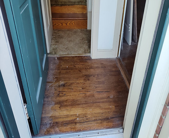 Moorestown townhome entry wood floors before refinishing