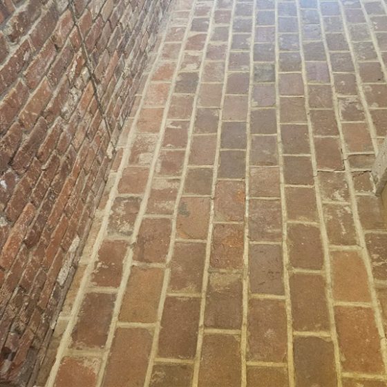 Dinghy brick hall floor in Moorestown