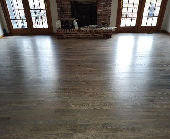 Family room red oak wood floor refinished