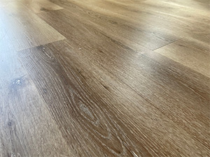 Textured LVP traps debris, lint, etc in grain /seamds & bevels