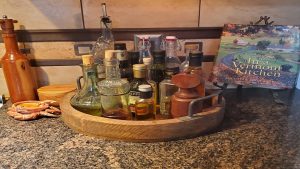 store vinegars on a tray on stone counters