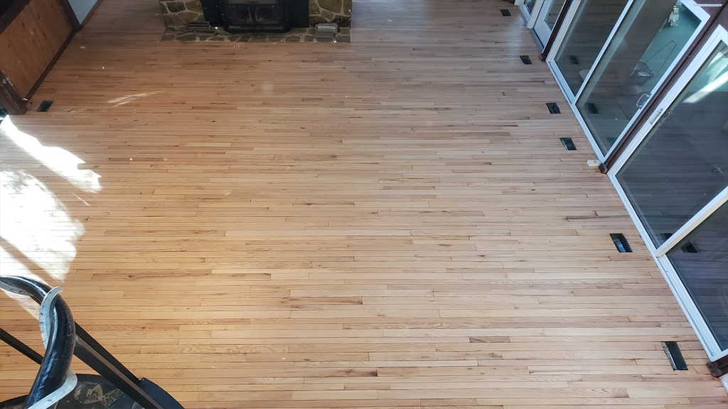 Hardwood floor is repaired, refreshed & refinished