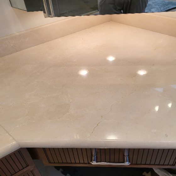 See how the ceiling light reflections are more brilliant after the marble was re-honed and polished