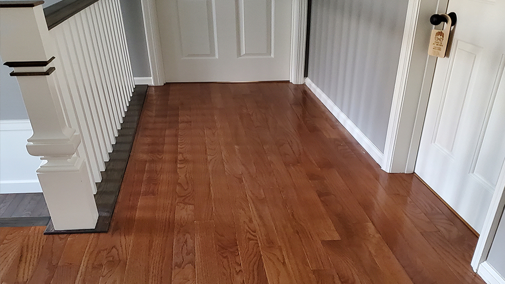 The hall stain and finish is applied, and now I bet the client calls to continue the color into the master
