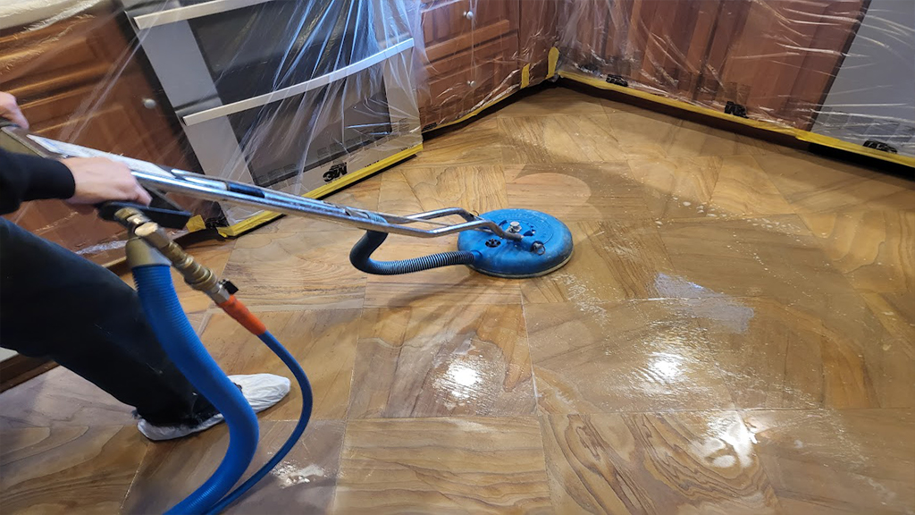 Grease removed with steam cleaning on sandstone floor