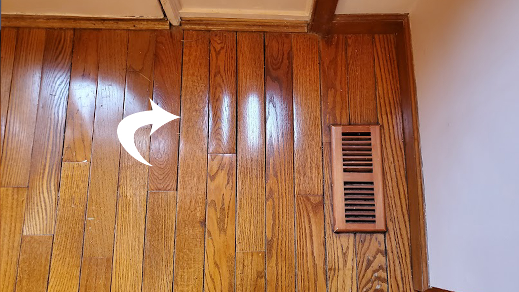 warped red oak floor board, cupped floor board, water damaged red oak board