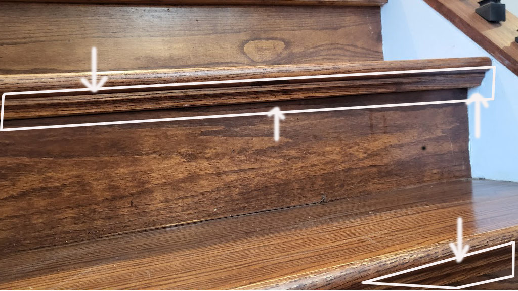 Incorrectly installed hardwood stair tread caps