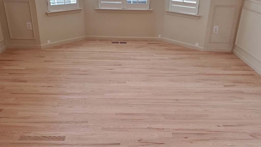 Dining room red oak floor installed, sanded in place
