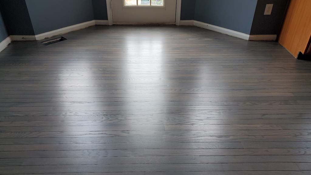 red oak hardwood refinished with beach and gray tones