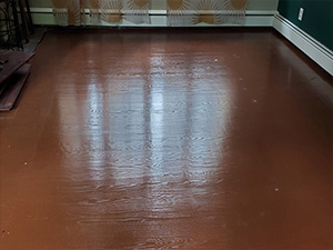 Horrible sanding and staining hardwood floor job
