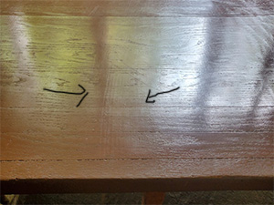 sanding staining against the grain on hardwood floor