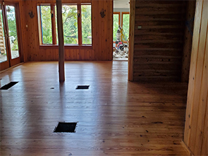 Lodge room pine floors blended for color in Medford Lakes