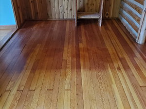 newer different sunfaded pine floor in Medford Lakes dining room