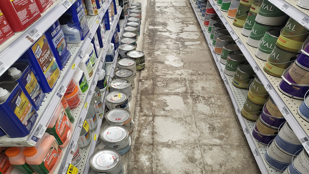 Hardware store Dirty VCT commercial floor before