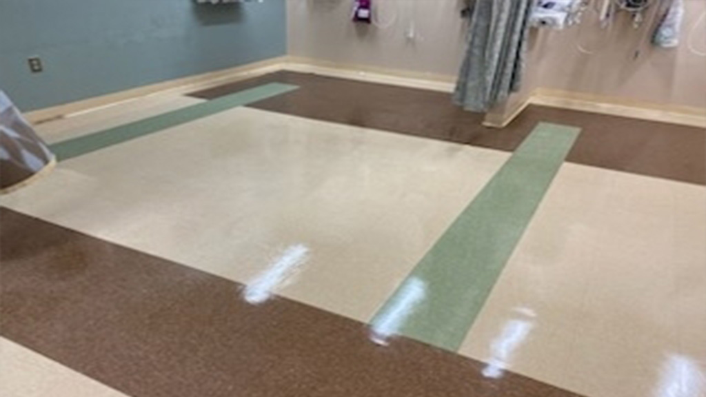 ER VCT floor stripped and refinished