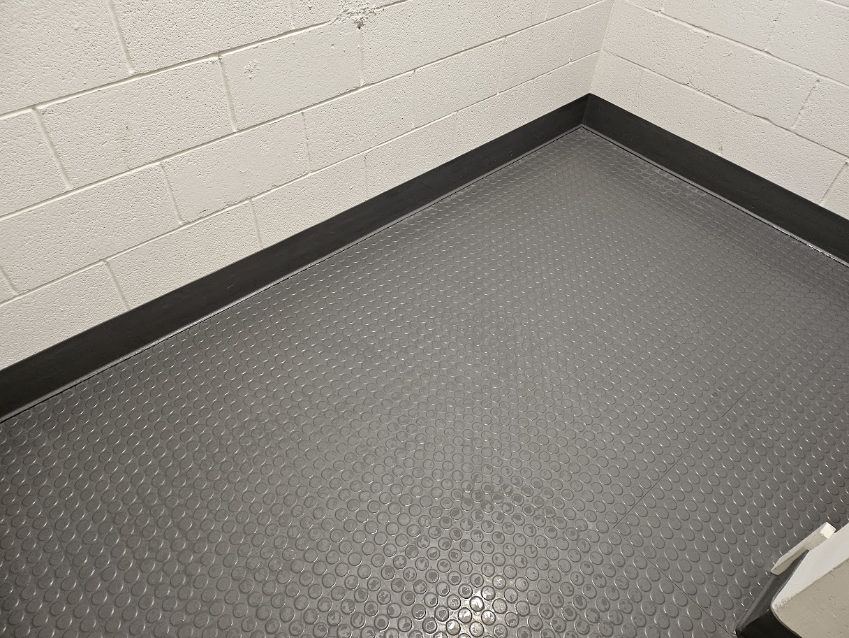rubber studded floor steamed and rinsed clean