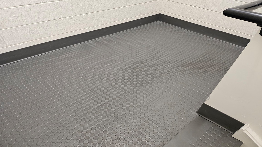 rubber studded floor hard to remove dirt, grease and oil