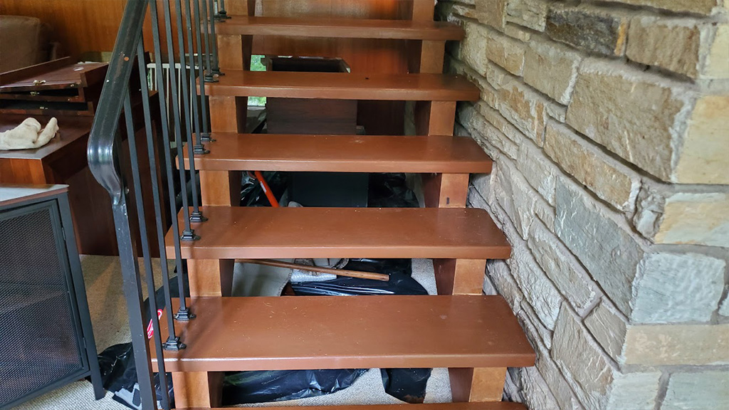 badly sanded & stained mahobany stairs in Yardley before fixing them