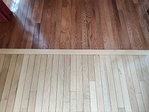 Burlington.hardwood.floor.color.differential.before.resanding