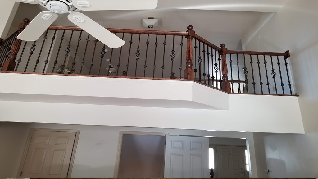 new railing with metal spindles