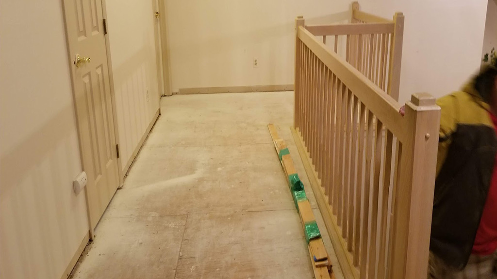 Mt Laurel balcony subfloor and old railing before replacing