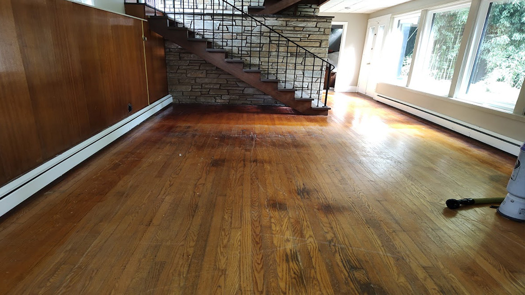 Yardley severe pet urine spots on hardwood floor, Morrisville badly stained hardwood floor with pet urine, Bucks Co Severely Pet damaged red oak hardwood floor