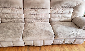 dirty microfiber sofa, visibly dirty upholstery