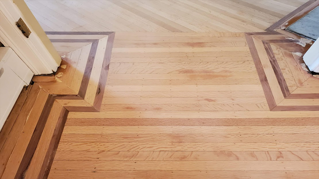 mahogany accent striping fixed in dining room entry