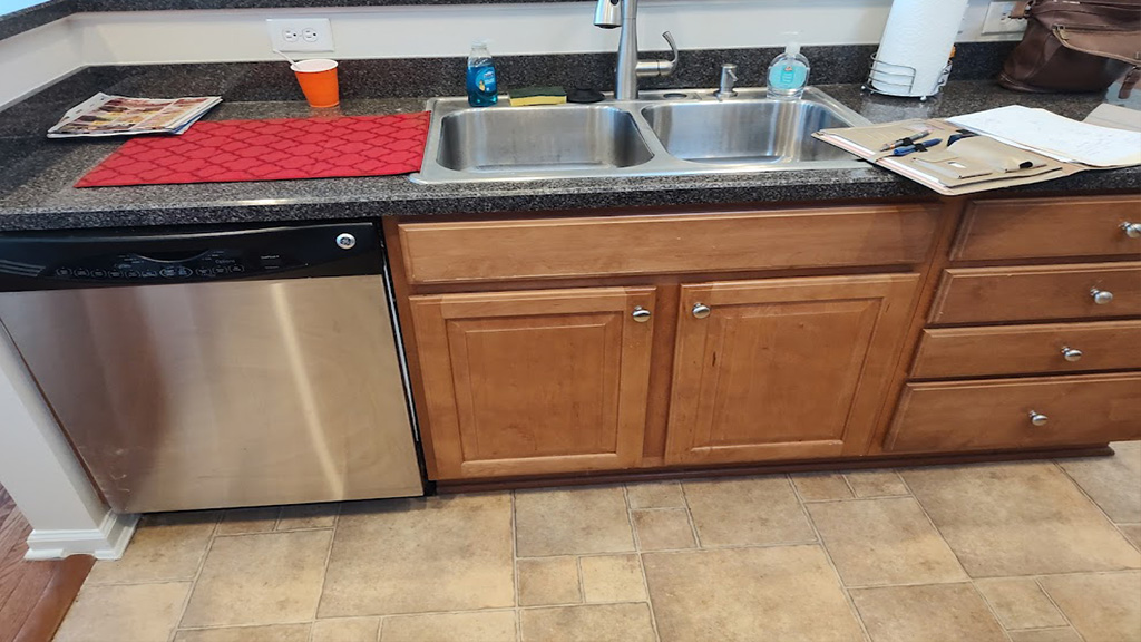 Kitchen vinyl in Hearthstone Retirement Community before replacement