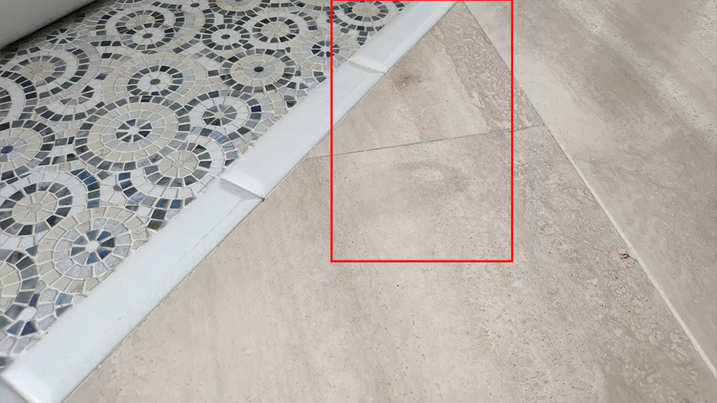 Travertine etch marks from cleaners or body care products left on the floor