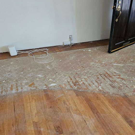 adhesive on hard wood floor