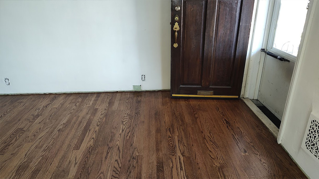 adhesive sanded off wood floor