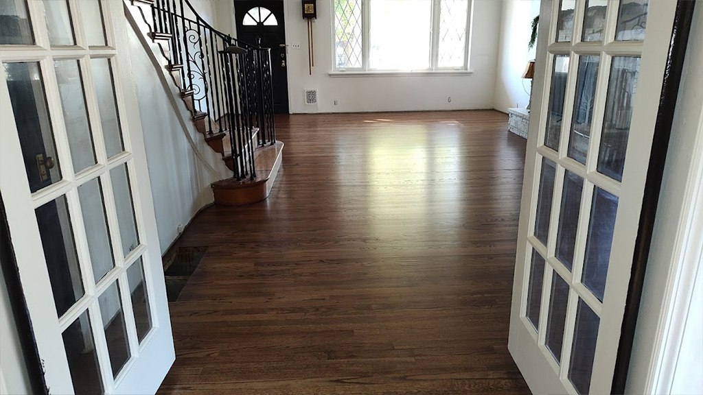 Stain damaged, scratched, adhesive fouled wood floor fixed