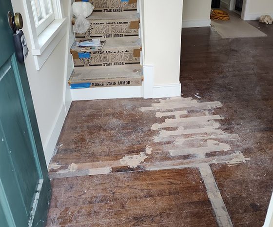Hardwood refinishing board repaired