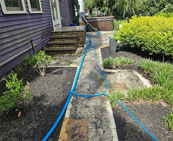 water logged travertine steps and sidewalk
