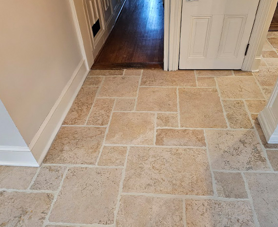 Travertine entry to foyer refreshed