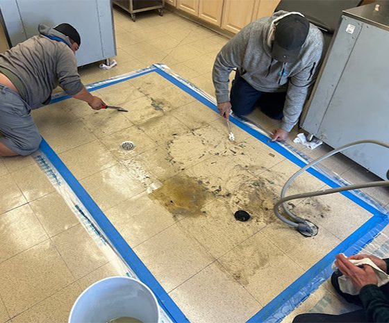Grease, dirt on VCT under partially moveable oven