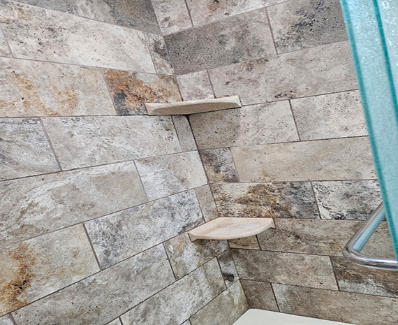 Steam cleaned tile & grout in bathtub