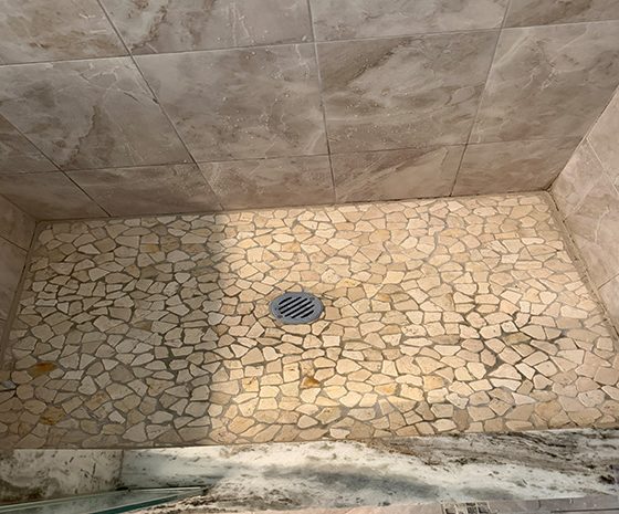 build up on mortared shower pan