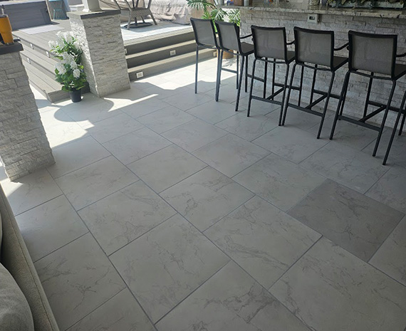 grout fixed and color sealed on porcelain patio