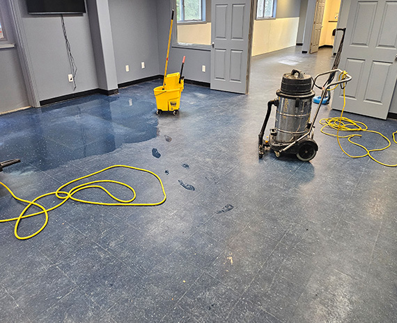 Bayville VCT lobby's stripping removes old dull wax
