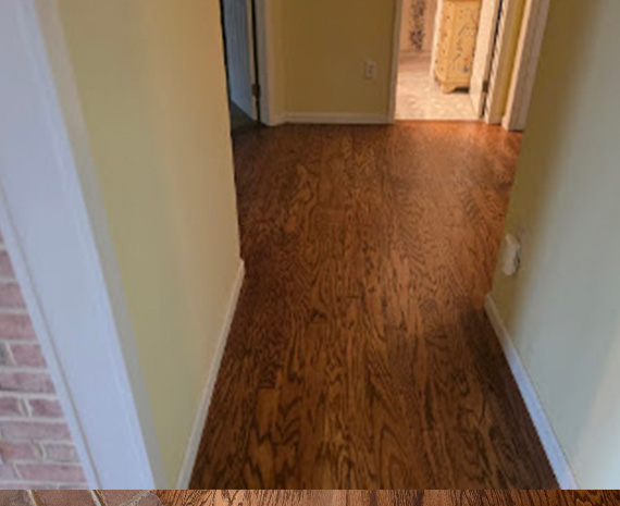 Mullica Hill engineered hardwood hallway refinished with custom stain and satin finish.